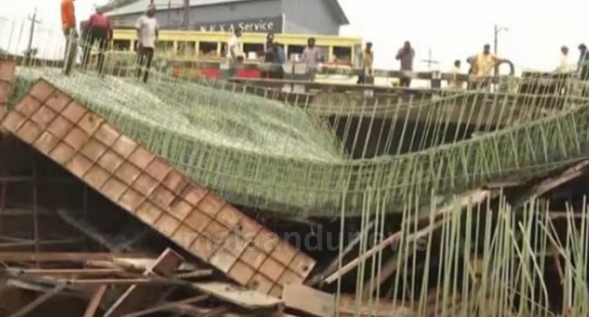 കൊല്ലത്ത് ദേശീയപാതാ വികസനത്തിൻ്റെ ഭാഗമായി നിർമാണം നടത്തിക്കൊണ്ടിരുന്ന പാലം തകർന്നു വീണു.