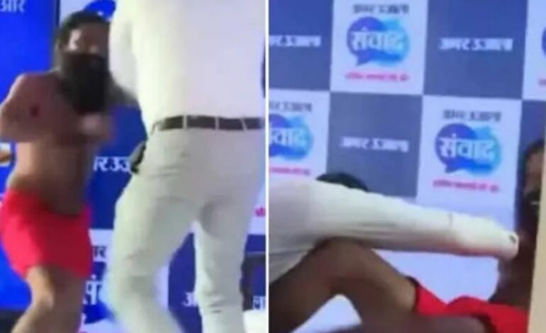 വേദിയില്‍ സൗഹൃദ ഗുസ്തി: മാധ്യമപ്രവര്‍ത്തകനെ തോല്‍പ്പിക്കാനിറങ്ങിയ ബാബയ്ക്ക് തിരിച്ചടി